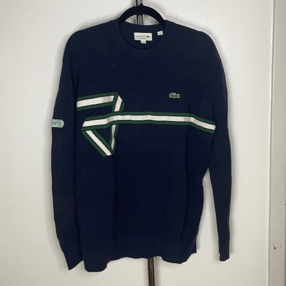 Lacoste sweatshirt.